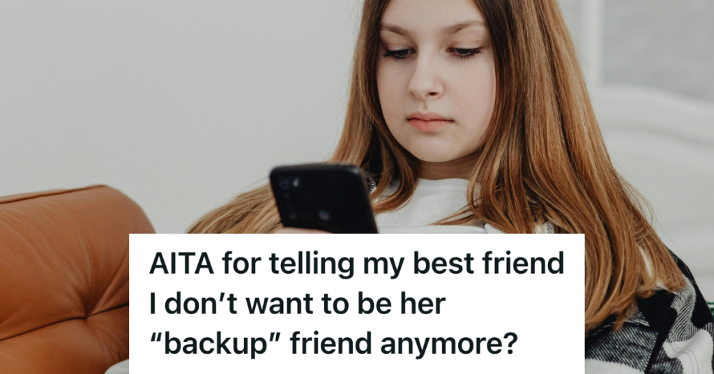 upset young woman on her phone