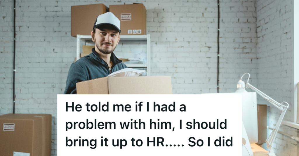 warehouse employee holding boxes