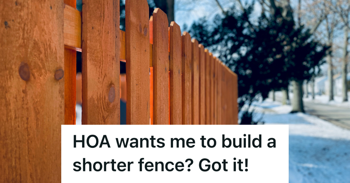 wooden fence in snow