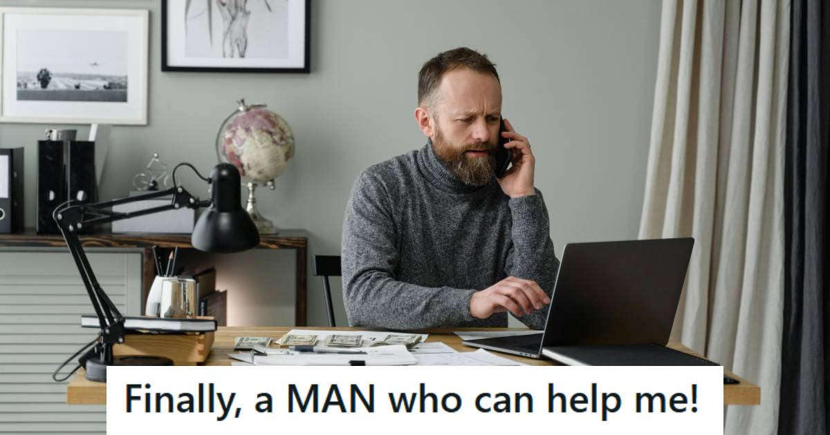 Man sitting at the desk taking a call from a customer