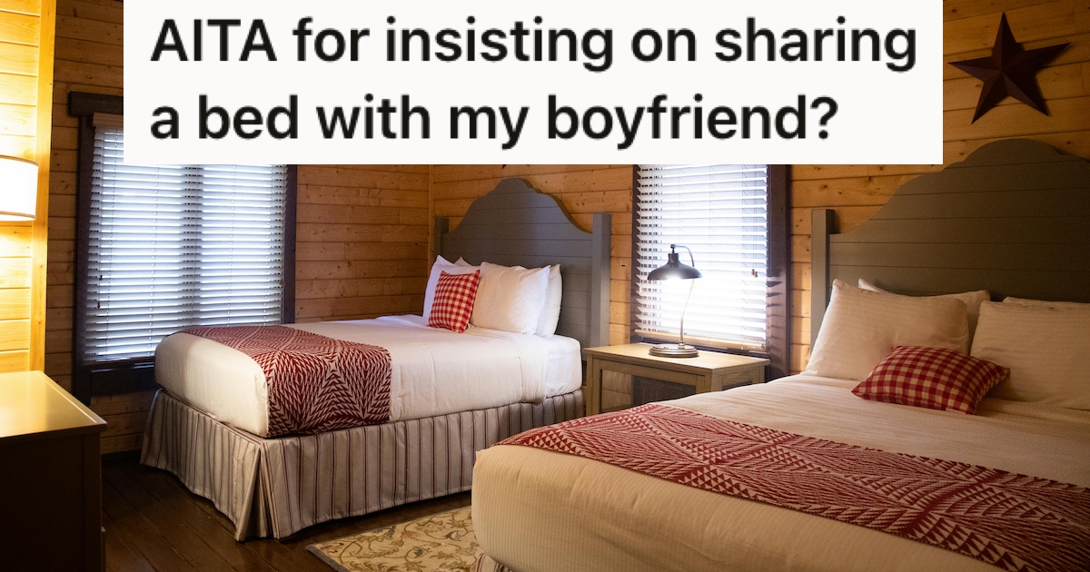 Two double beds in a hotel room