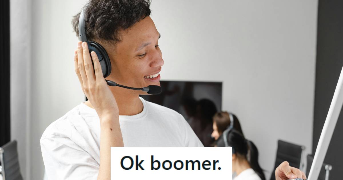 Millennial working at a call center with a headset on