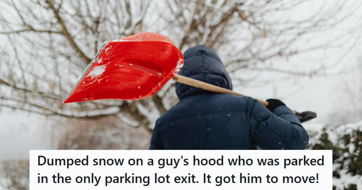 Man walking away with his snow shovel once the job is done