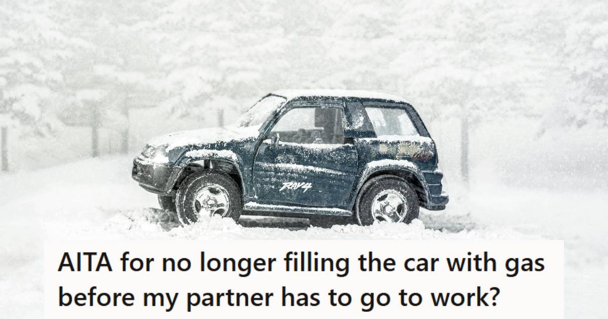 Green Toyota Rav4 sitting in the snow, waiting for someone to leave