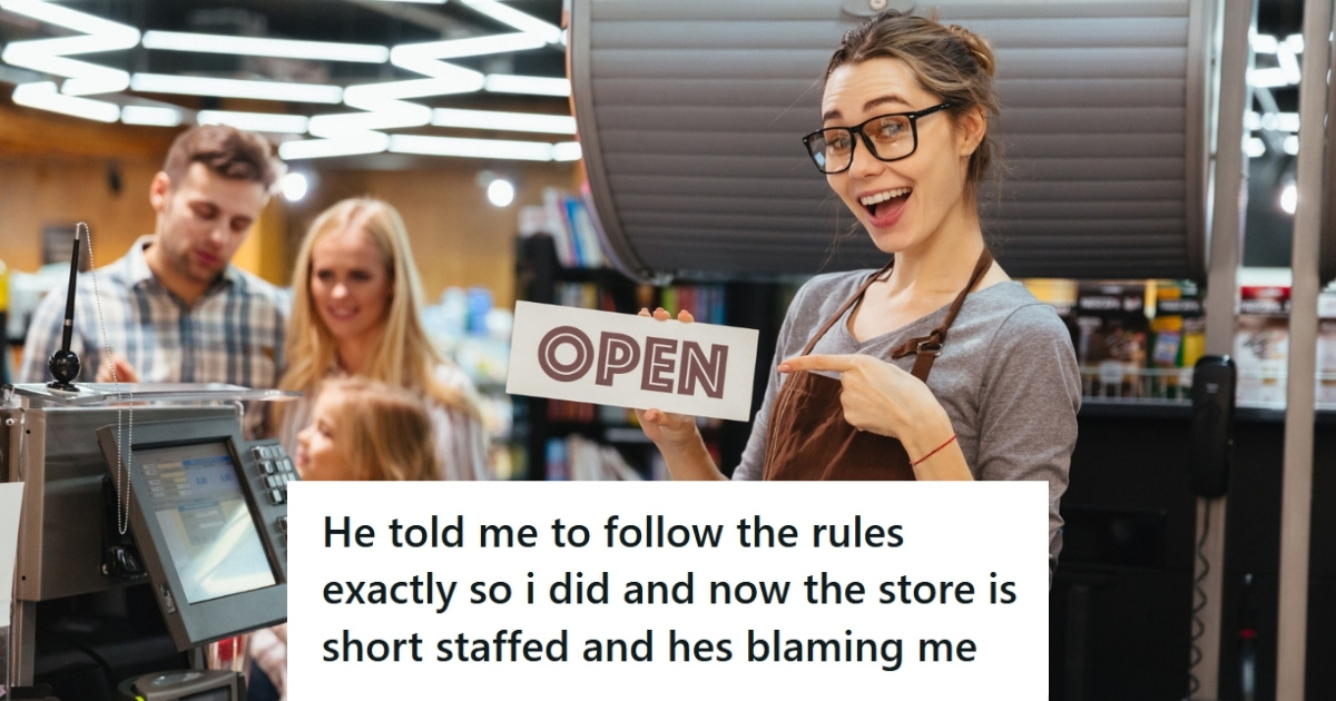 Cashier holding an open sign