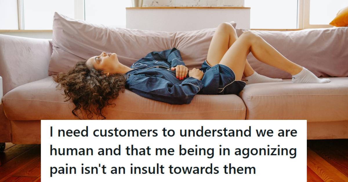 Woman laying on the couch in excruciating pain