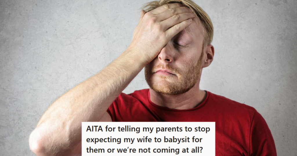 Man in red shirt rubbing his head