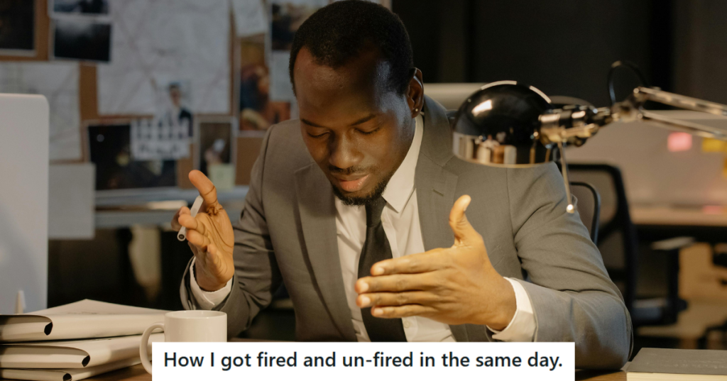 Man in grey suit working in office