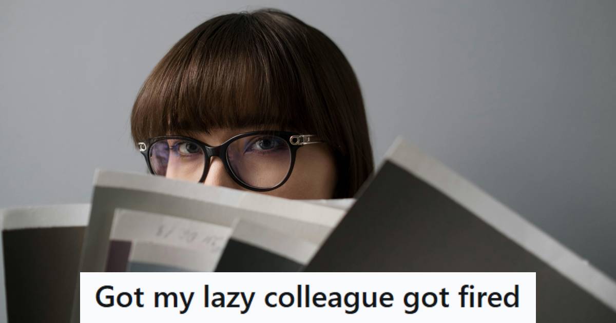 Admin assistant hiding behind folders in the office