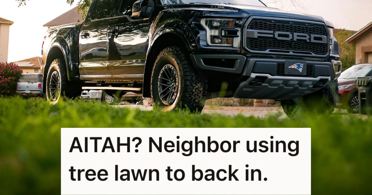 Pickup Truck parked by the grass in a residential street