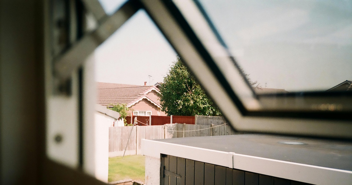 An open window overlooking a garden