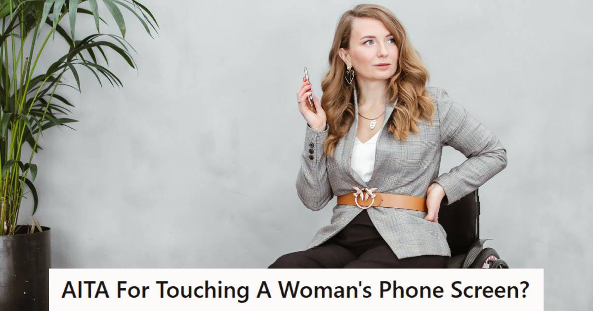 Woman in wheelchair holding her phone screen up