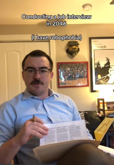 Hilarious TikTok video shows what job interviews will be like in 2046 when AI and robots enter the workforce A man interviewing a robot