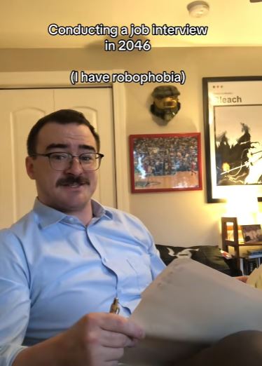Hilarious TikTok video shows what job interviews will be like in 2046 when AI and robots enter the workforce A man interviewing a robot