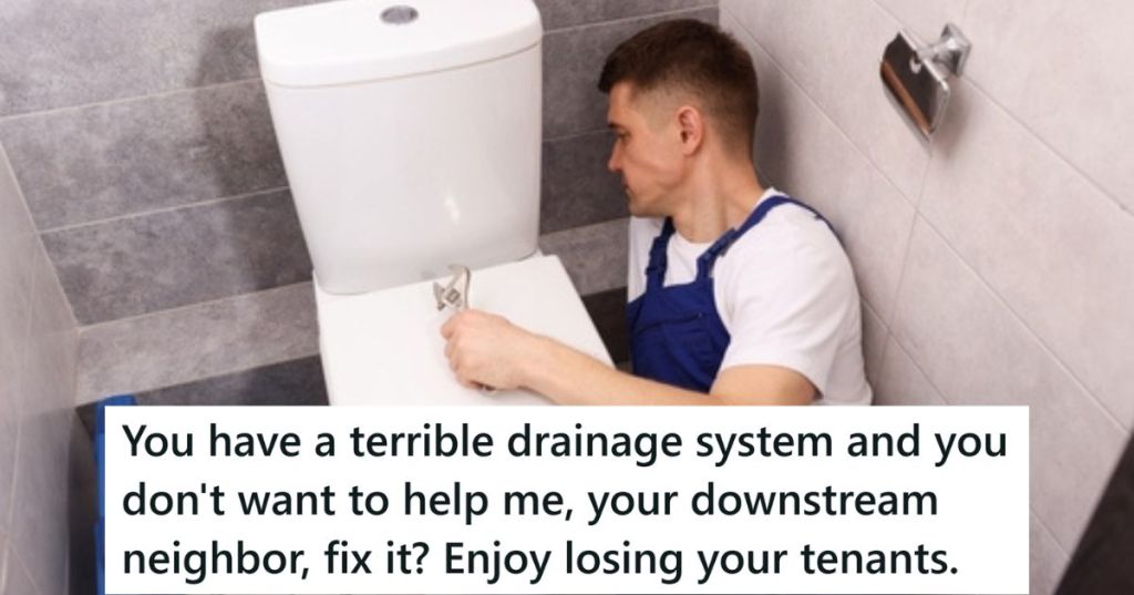 Plumber working on toilet