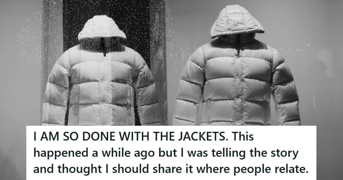 White puffer jackets behind glass in a retail display