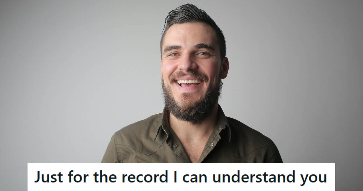 Man smiling because he was able to understand a woman being rude in Spanish