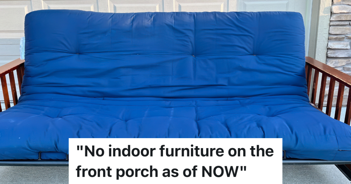 wooden futon with a blue cushion outside
