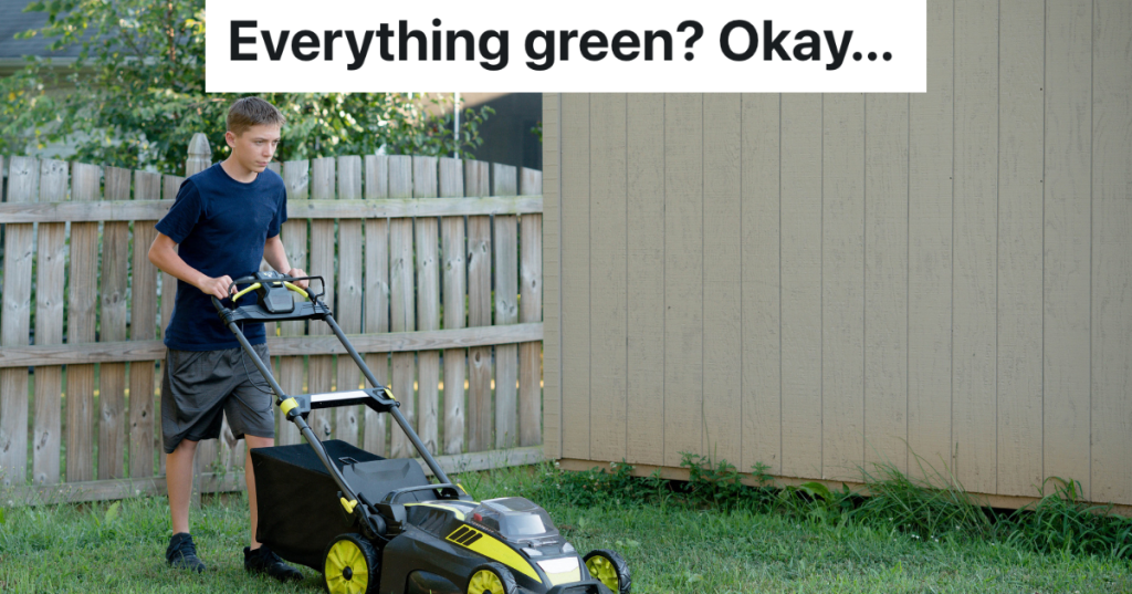 teenage boy mowing lawn
