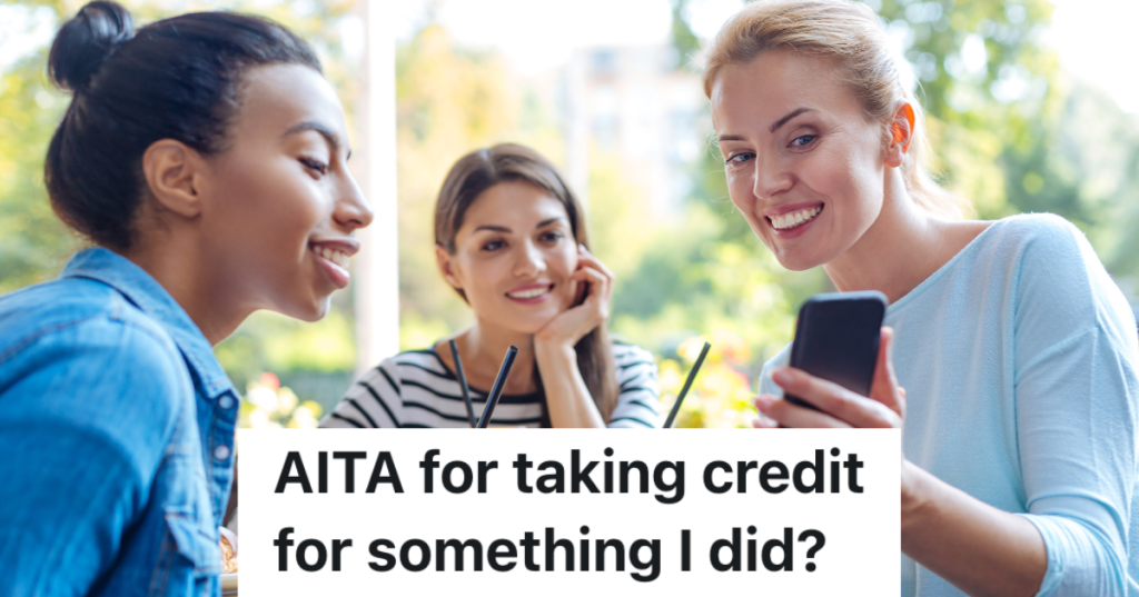 woman showing something on her phone to her friends