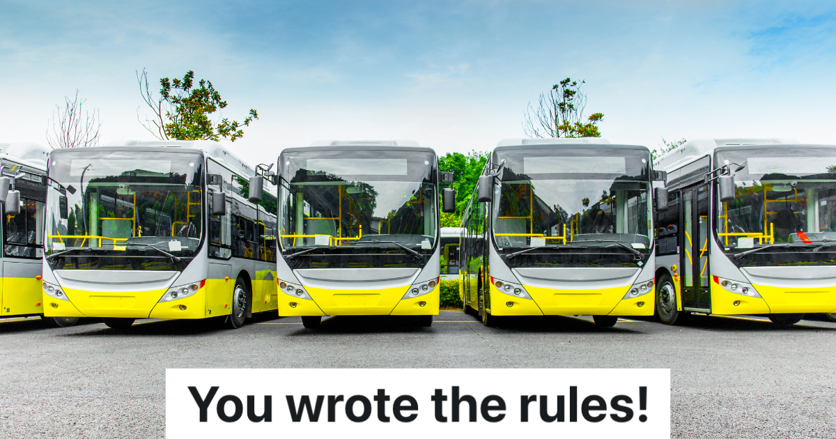 city buses parked in parking lot