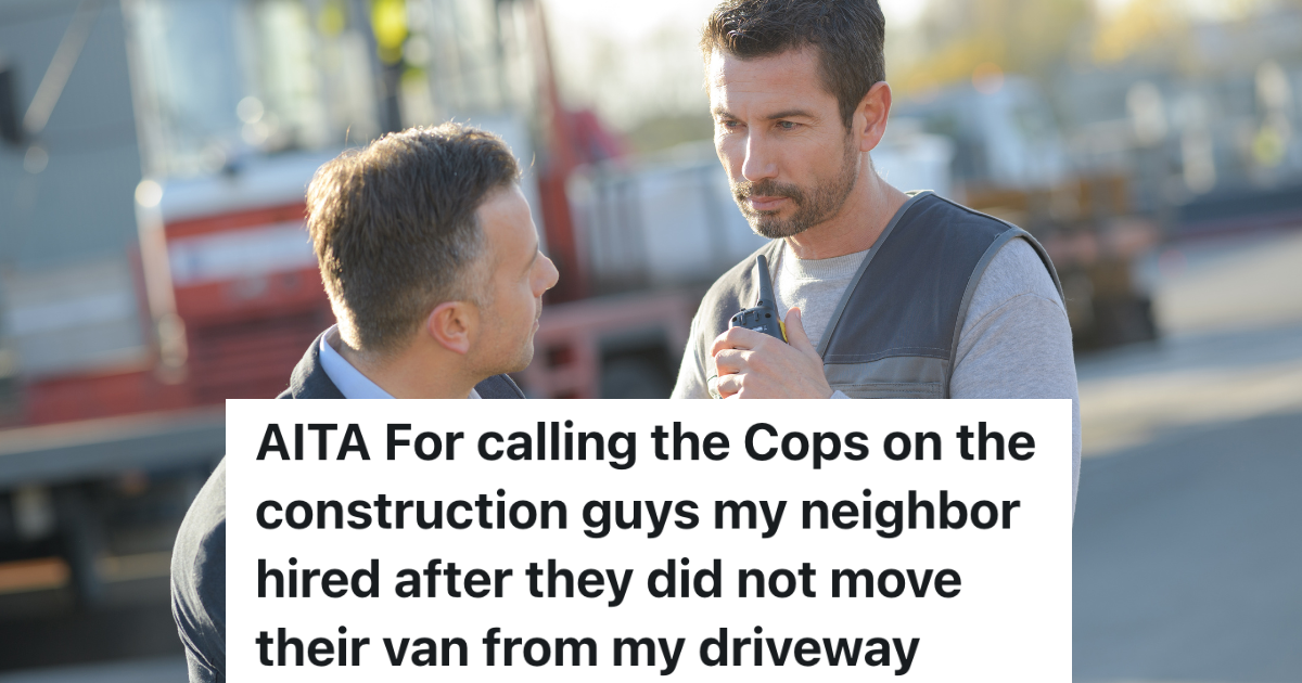 man in suit talking to construction worker