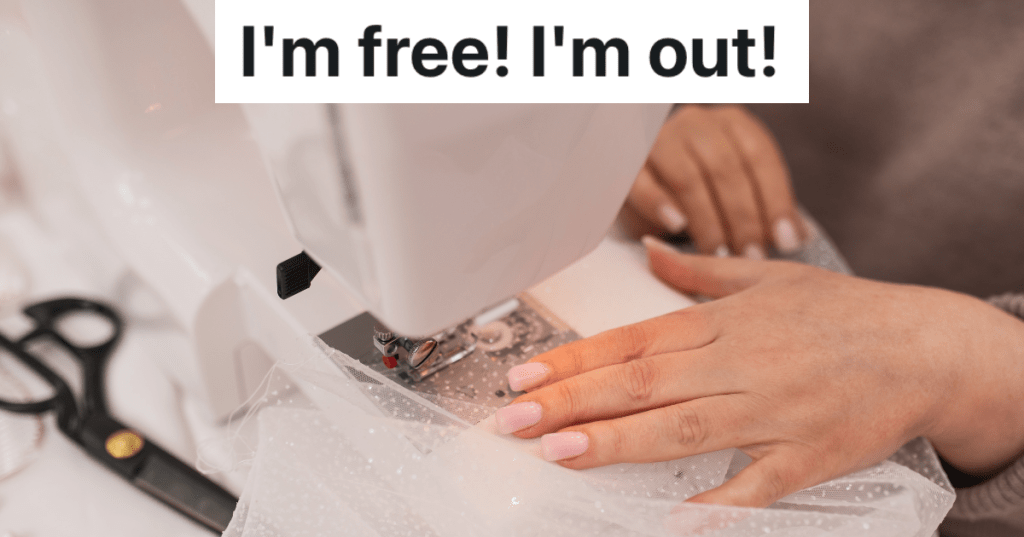 closeup of woman using a sewing machine