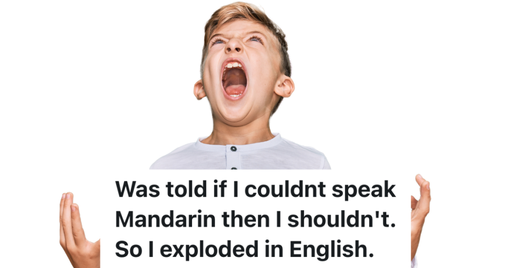 angry boy in white shirt looking up and yelling