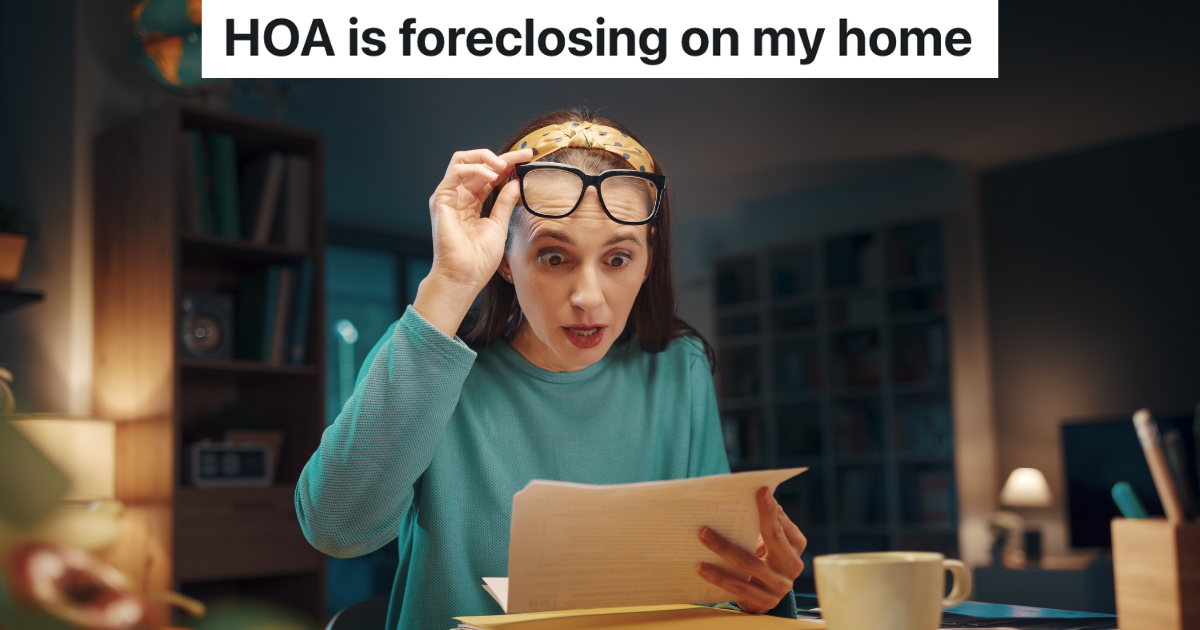 shocked woman reading a piece of paper that came in the mail