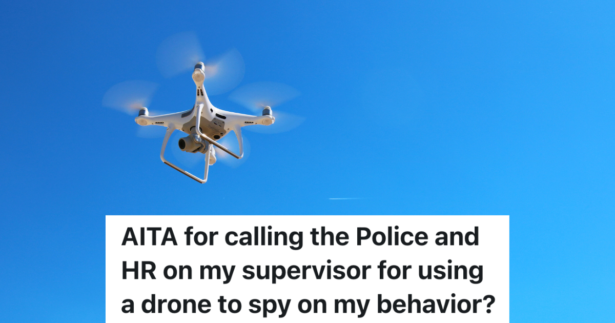 white drone flying against blue sky