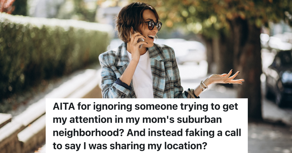 woman walking in neighborhood while talking on the phone