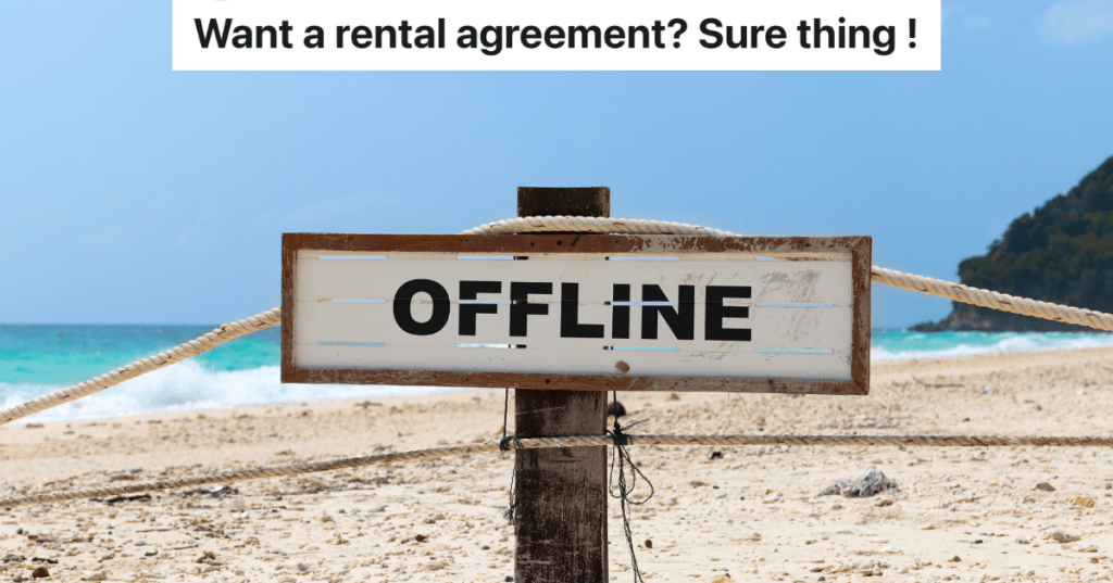 sign on the beach that reads 