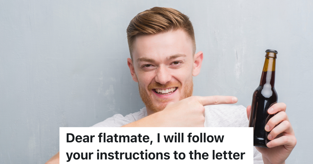 smiling man holding bottle of beer