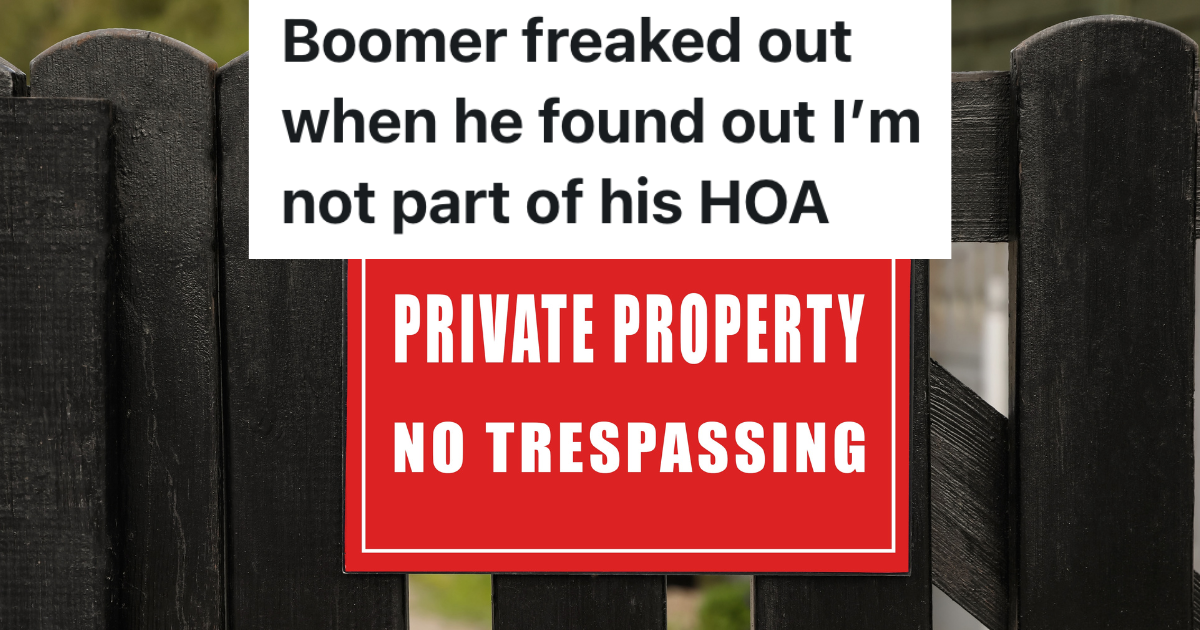 red sign on wooden fence that reads "private property no trespassing"