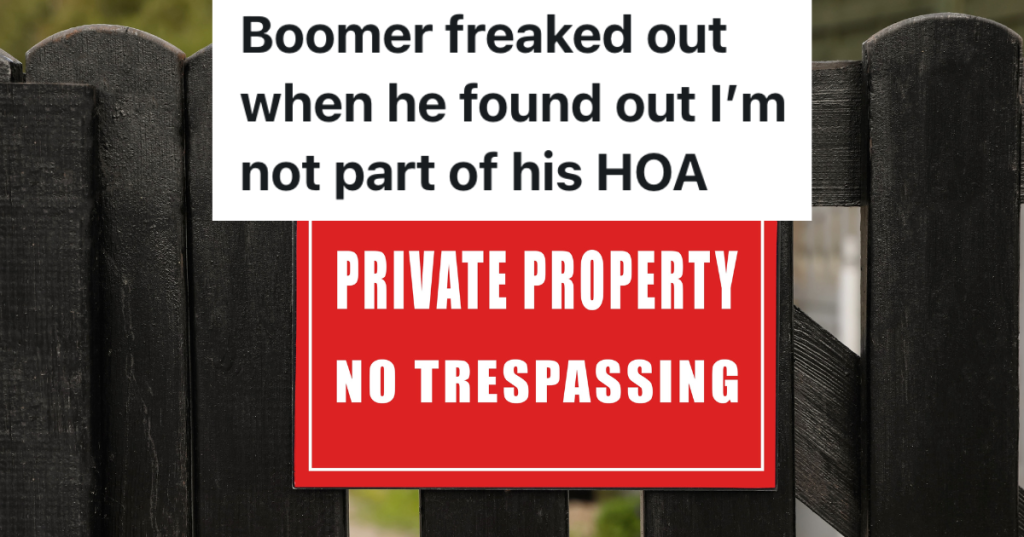 red sign on wooden fence that reads 