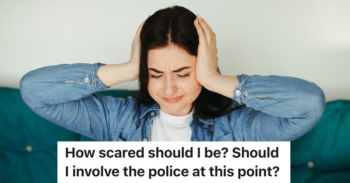 woman covering her ears