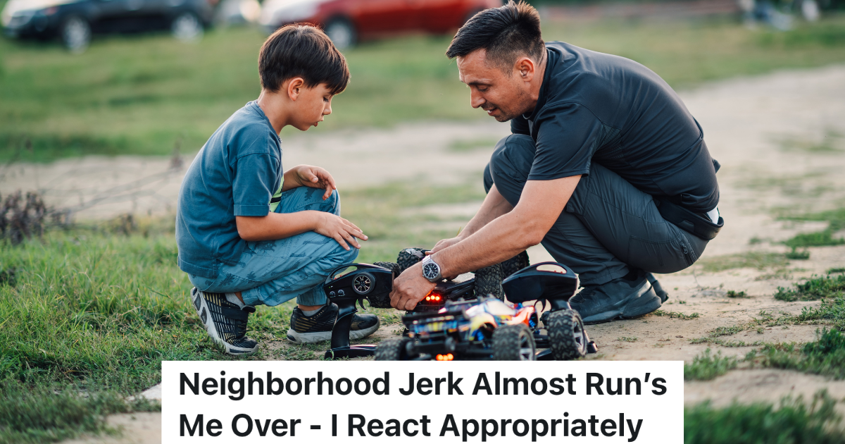 father and son looking at RC car