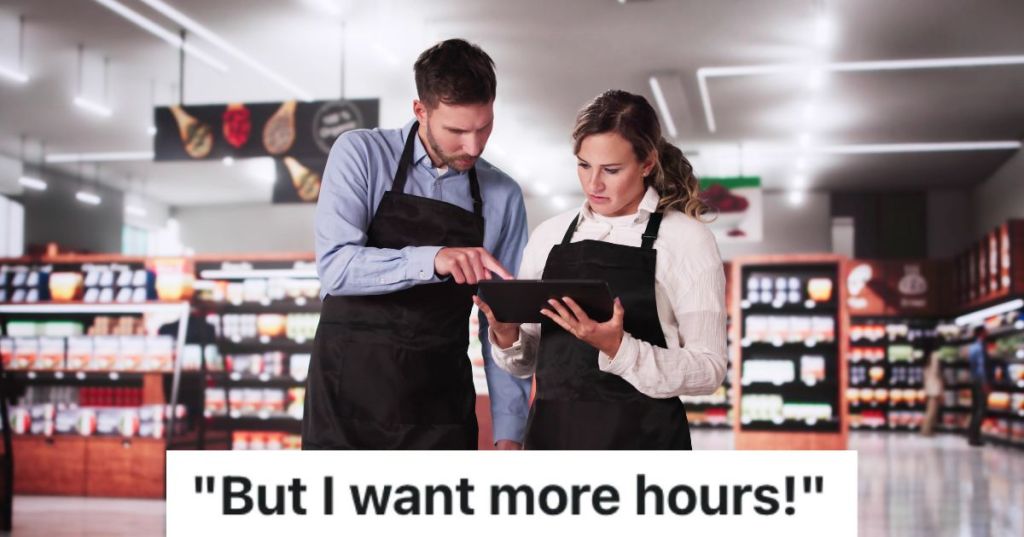 two grocery store employees looking at a tablet