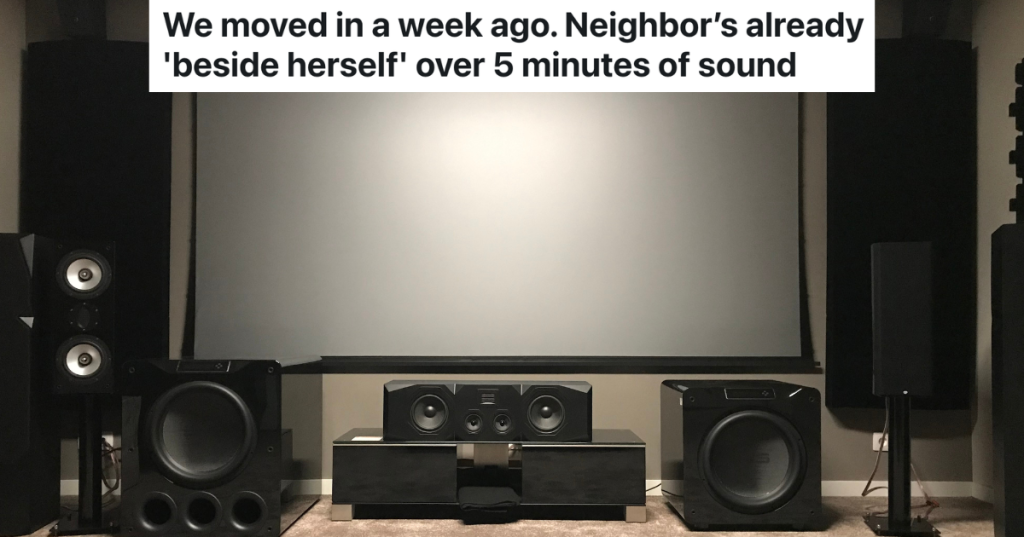 home theater with projector screen and speakers