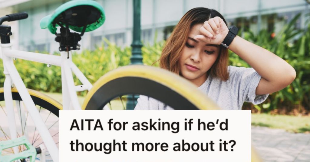 Woman feeling tired from fixing her bike