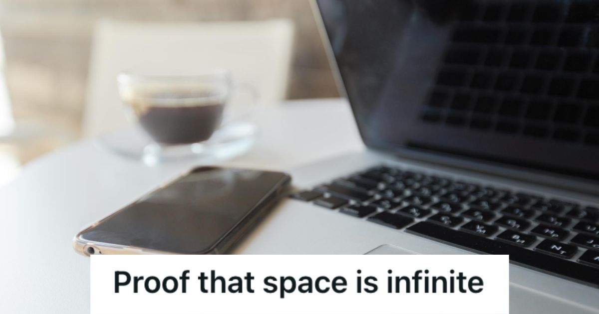 A mobile phone sitting on the laptop's keyboard