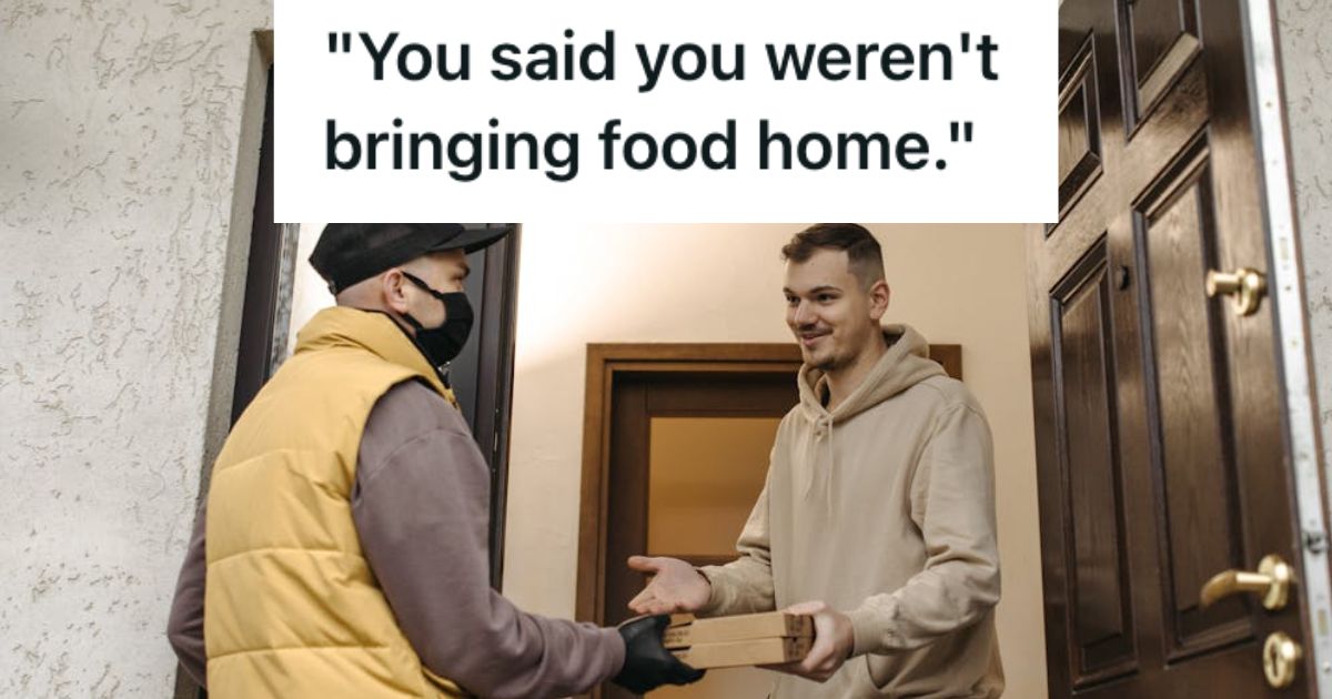 Man delivering pizza to a male customer