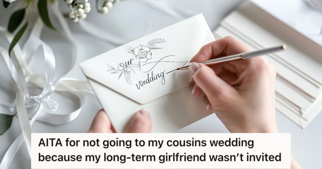 Person writing their wedding invitation in cursive