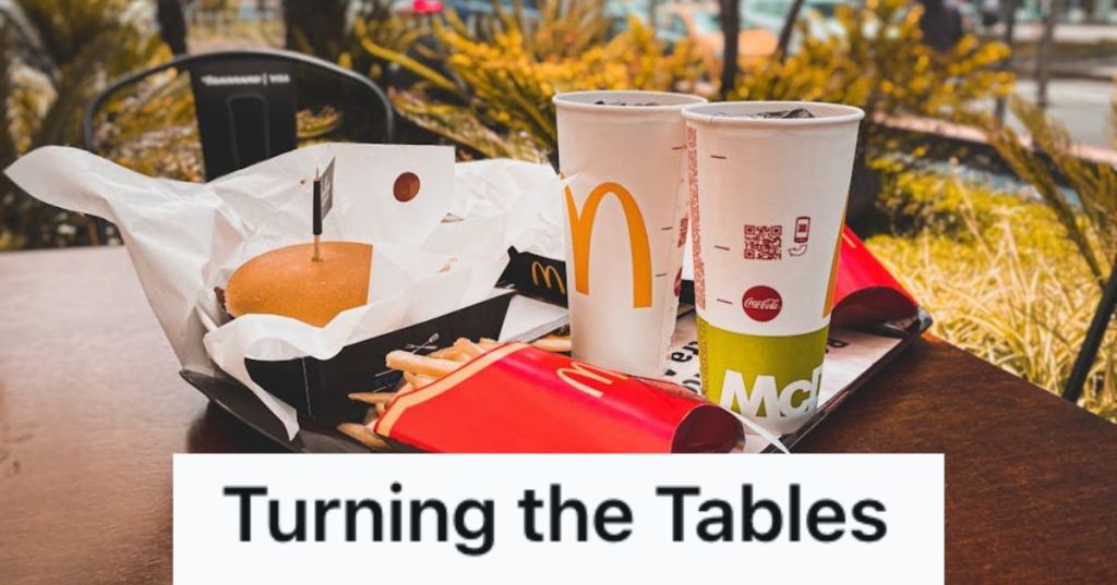 A McDonald's meal and drinks set on an outdoor table