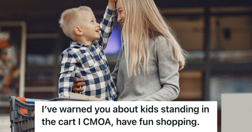 Woman shopping with her son standing in the shopping cart