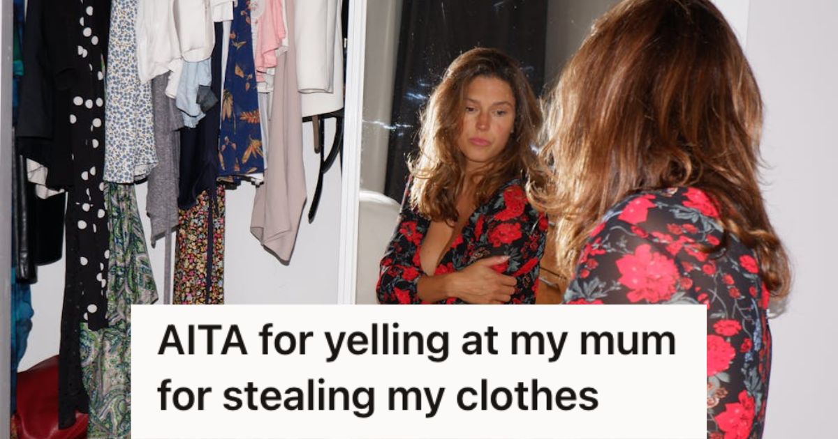 Woman trying on some clothes and looking at herself in the mirror