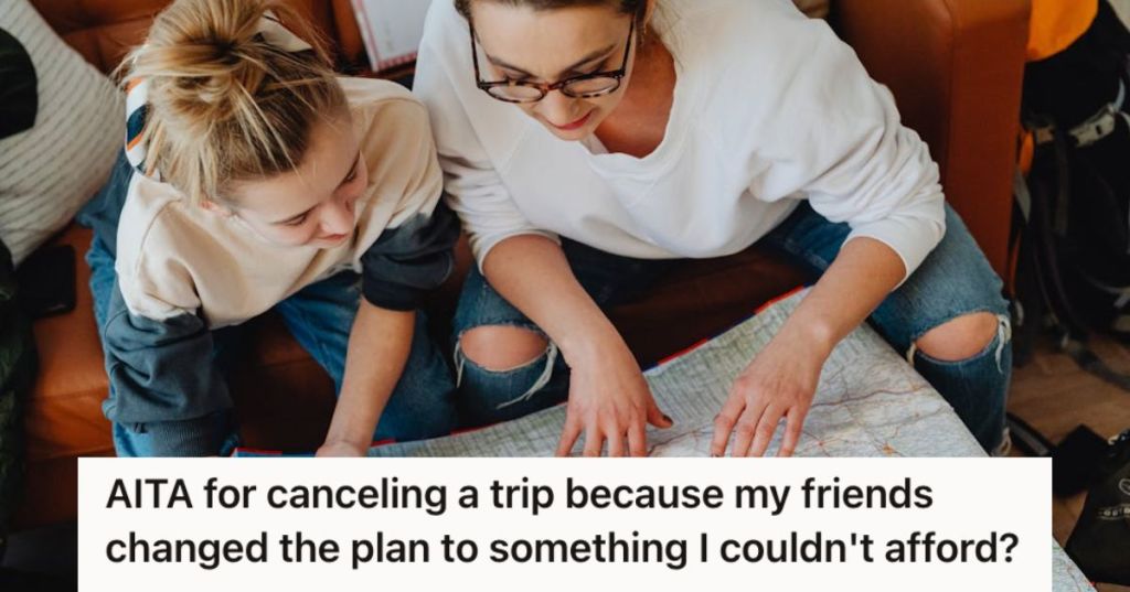 Two women looking at a map and planning a trip