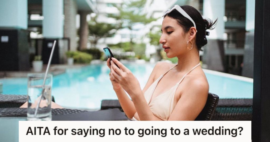 Woman looking at her phone and relazing by the pool