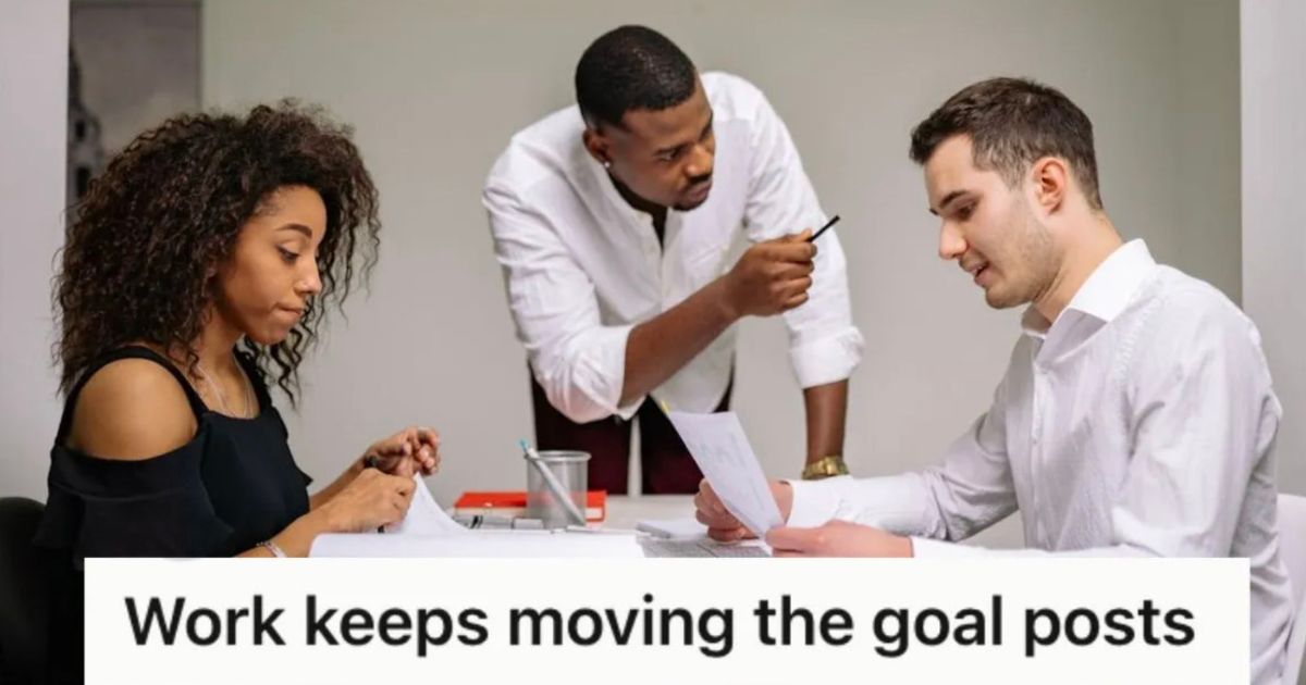 boss and employees having meeting in office