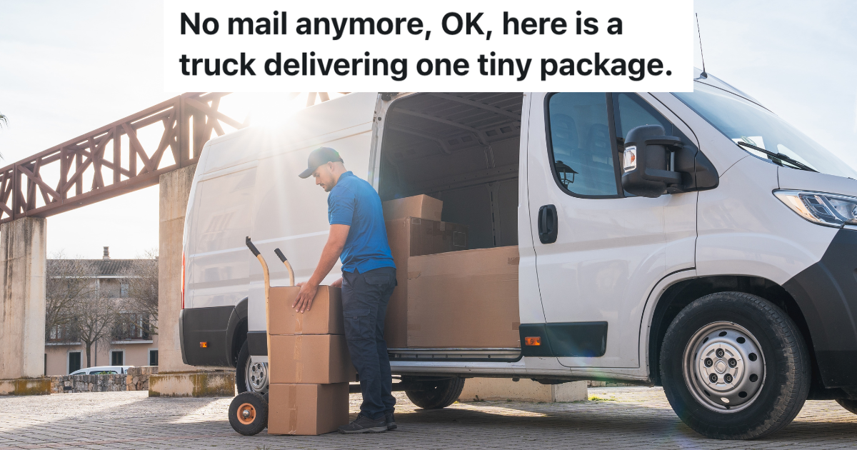 delivery driver standing next to white van with cardboard boxes